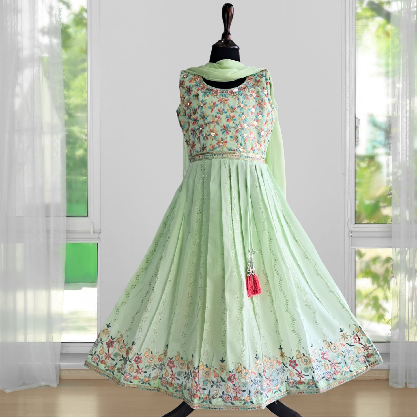 (AD-9095) Pista Green Ethnic Dress With Stunning Multi Color Embroidery and Rich Border