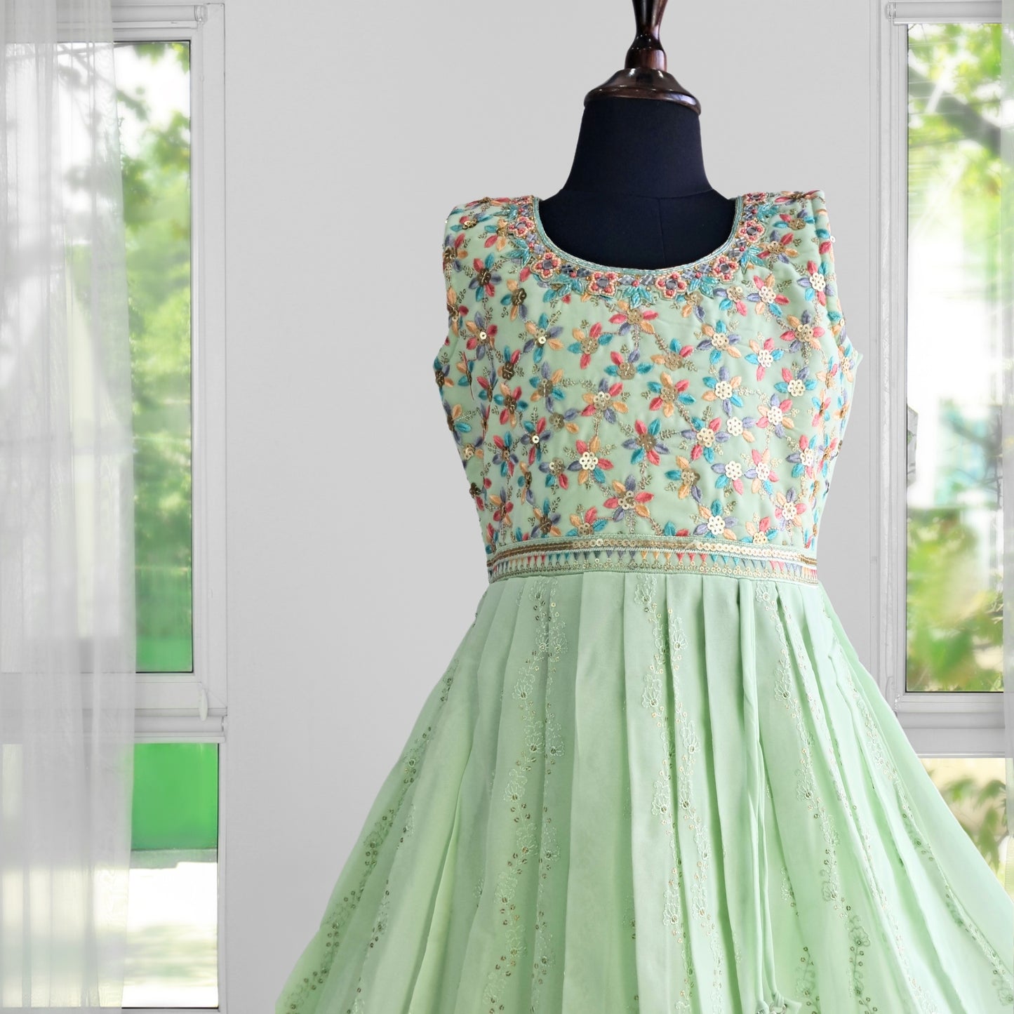 (AD-9095) Pista Green Ethnic Dress With Stunning Multi Color Embroidery and Rich Border